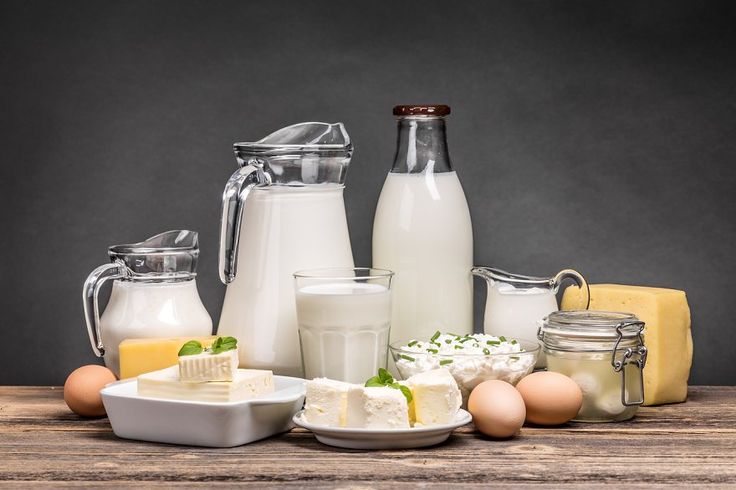 assortment of dairy products containing product, milk, and organic