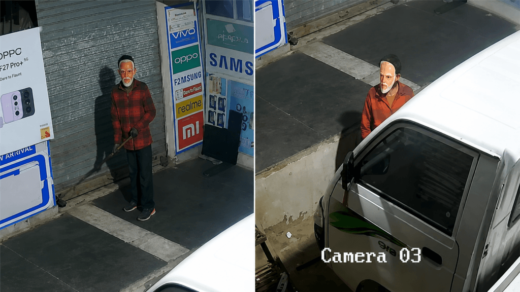 A suspected burglar in a PM Modi mask is caught on CCTV footage in Bhilwara, Rajasthan, during a mobile shop burglary.