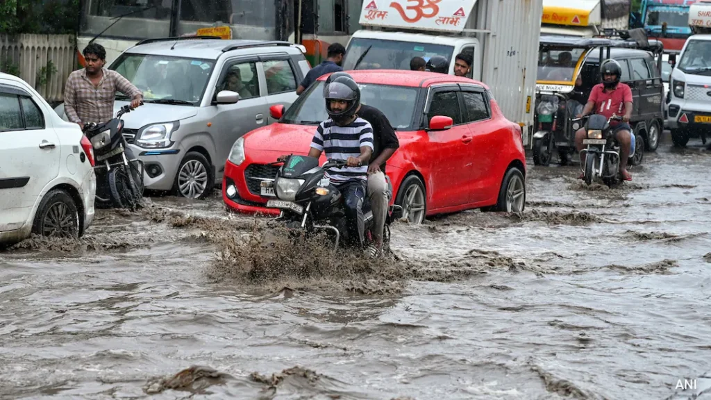 Delhi-NCR Rain Alert: Heavy Monsoon Showers Trigger Waterlogging as IMD Issues Orange Warning